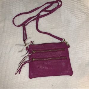 Multiple zipper fuchsia bag